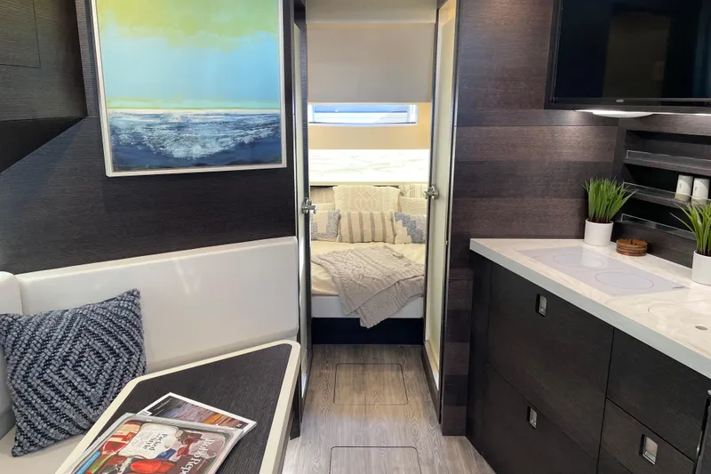  Yacht Photos Pics Luxurious interior of 2025 Scout 530 LXF yacht with modern decor and cozy cabin.