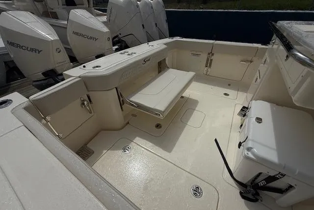  Yacht Photos Pics 2026 Scout 288 LXF boat deck with seating and Mercury engines.