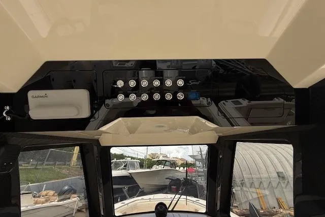  Yacht Photos Pics 2026 Scout 288 LXF boat dashboard with Garmin electronics and control panel.