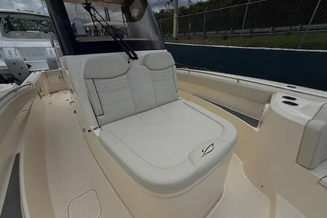  Yacht Photos Pics 2026 Scout 288 LXF boat with luxurious seating and sleek design.
