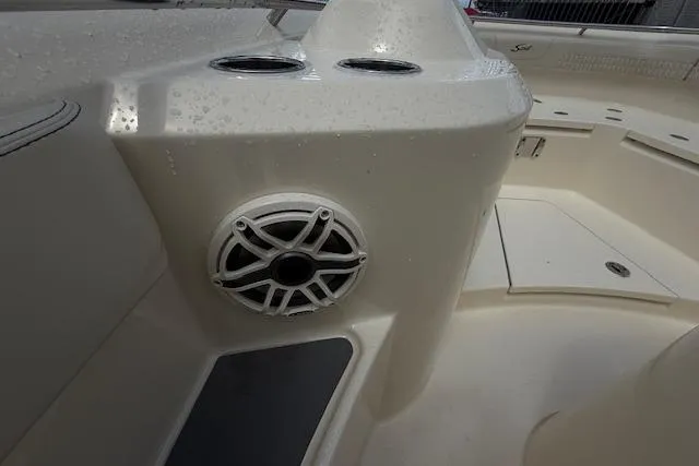  Yacht Photos Pics 2026 Scout 288 LXF boat interior with speaker and cup holders.