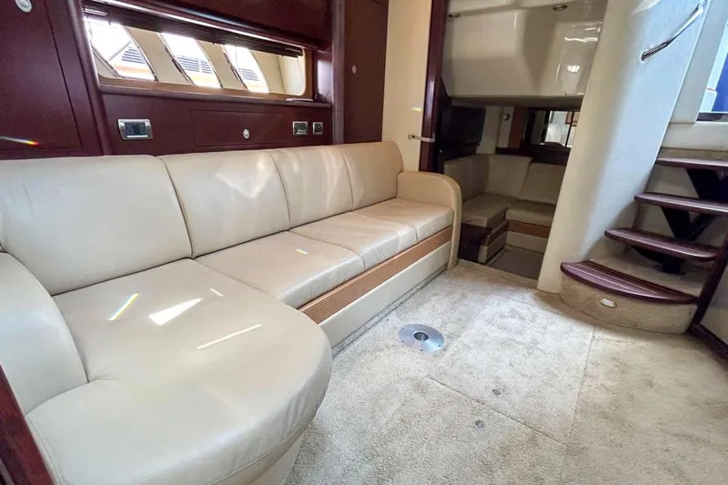  Yacht Photos Pics Luxurious interior of 2007 Sea Ray 40 Sundancer yacht with beige leather seating.