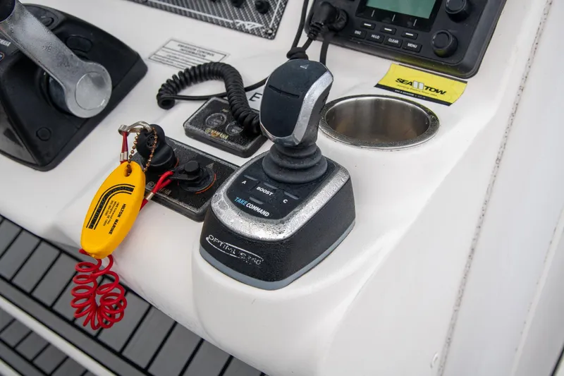  Yacht Photos Pics Control panel of 2021 Tidewater 280 CC Adventure boat with joystick and safety lanyard.