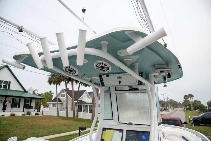  Yacht Photos Pics 2021 Tidewater 280 CC Adventure boat with rod holders and speakers on the T-top.