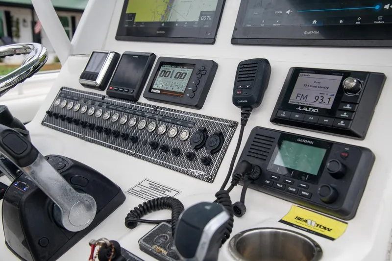  Yacht Photos Pics Control panel of 2021 Tidewater 280 CC Adventure boat with navigation and communication equipment.
