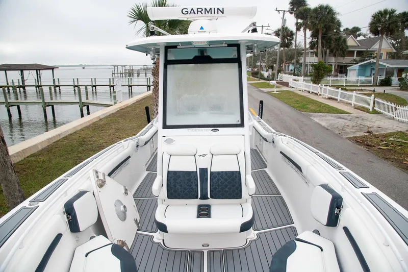  Yacht Photos Pics 2021 Tidewater 280 CC Adventure boat with spacious seating and Garmin navigation system.