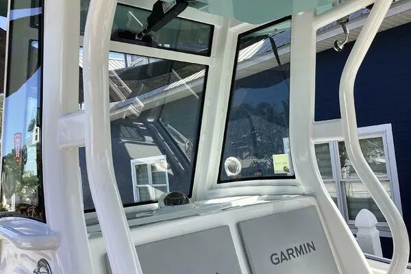  Yacht Photos Pics 2021 Tidewater 280 CC Adventure boat console with Garmin navigation system.