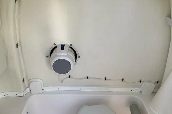  Yacht Photos Pics Interior of 2021 Tidewater 280 CC Adventure boat, featuring a mounted speaker.