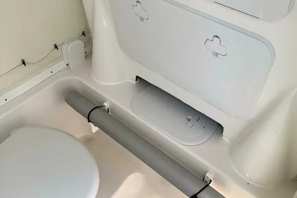  Yacht Photos Pics Interior of 2021 Tidewater 280 CC Adventure boat, featuring storage compartments and seating.