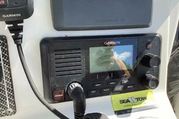  Yacht Photos Pics Garmin marine radio on 2021 Tidewater 280 CC Adventure boat dashboard.