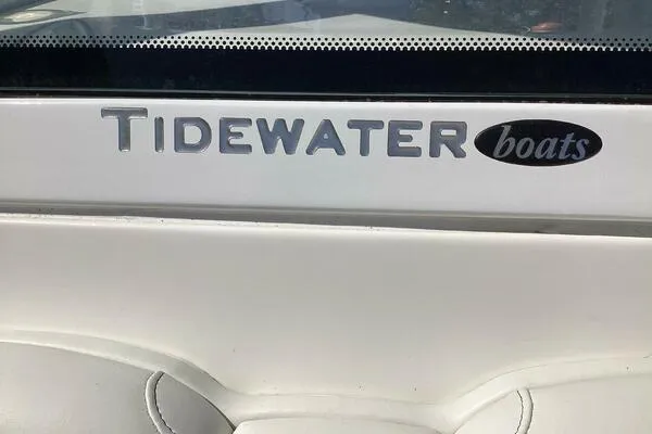  Yacht Photos Pics Tidewater 280 CC Adventure 2021 boat logo on white surface.