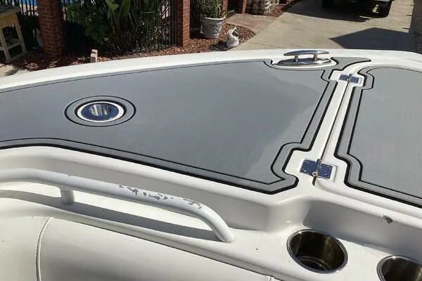  Yacht Photos Pics 2021 Tidewater 280 CC Adventure boat deck with sleek design and stainless steel fixtures.