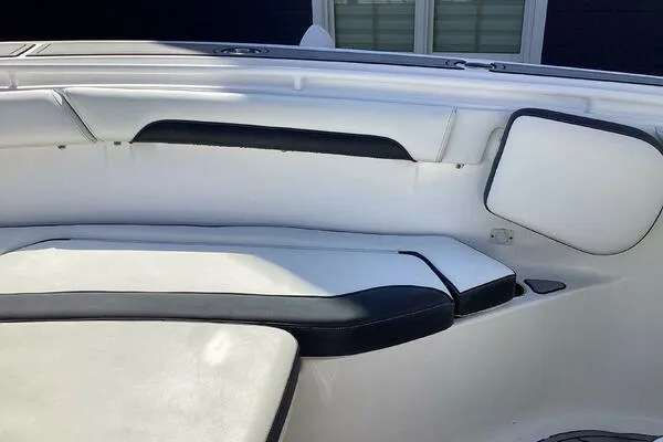  Yacht Photos Pics 2021 Tidewater 280 CC Adventure boat interior with white and black seating.