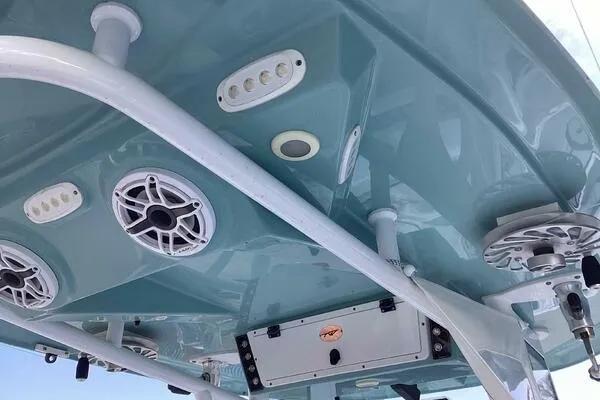  Yacht Photos Pics 2021 Tidewater 280 CC Adventure boat ceiling with speakers and rod holders.