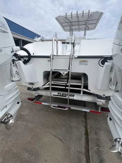  Yacht Photos Pics 2024 Twin Vee 280 STX boat with dual engines and rear ladder.