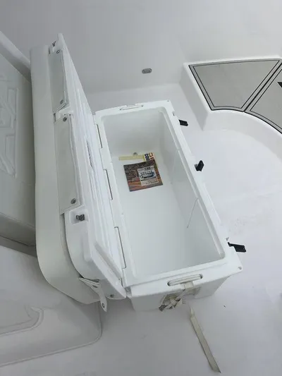  Yacht Photos Pics Open storage compartment on 2024 Twin Vee 280 STX boat.