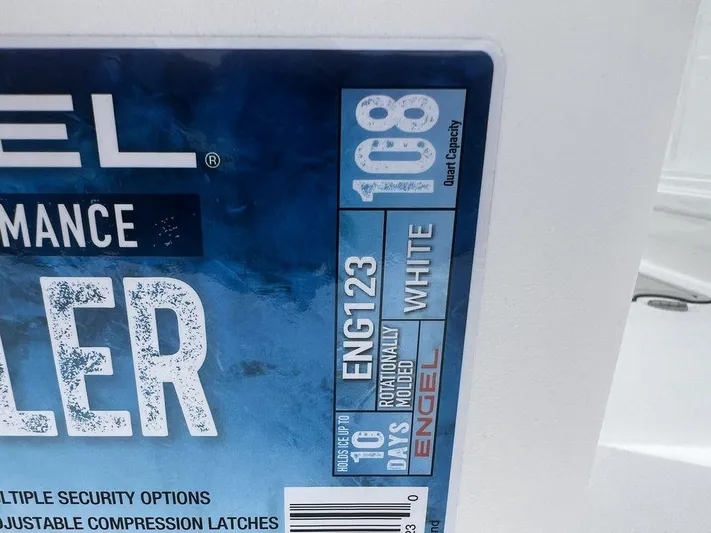  Yacht Photos Pics Engel cooler label showing 108-quart capacity, model ENG123, white, holds ice up to 10 days.