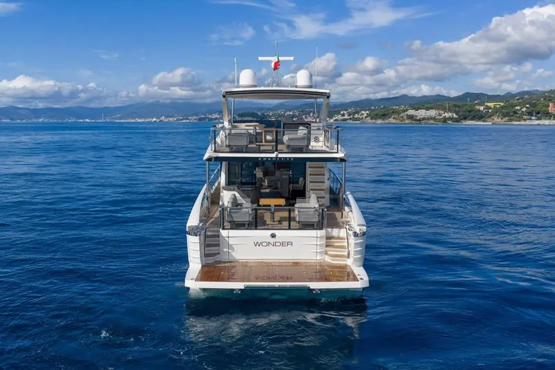  Yacht Photos Pics Luxury Absolute 70 Fly yacht cruising on open sea, 2026 model.