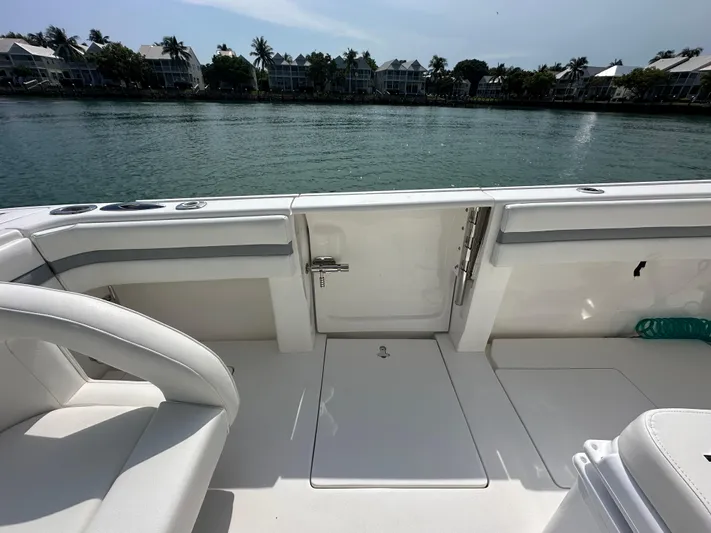  Yacht Photos Pics 2015 Intrepid 400 Center Console boat interior with waterfront view.