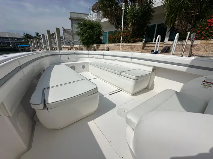  Yacht Photos Pics 2015 Intrepid 400 Center Console boat interior with white seating and spacious deck.