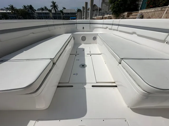  Yacht Photos Pics 2015 Intrepid 400 Center Console boat interior with white seating and spacious deck.