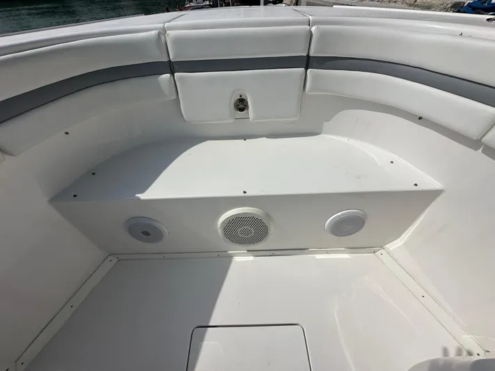  Yacht Photos Pics 2015 Intrepid 400 Center Console boat interior with seating and speakers.