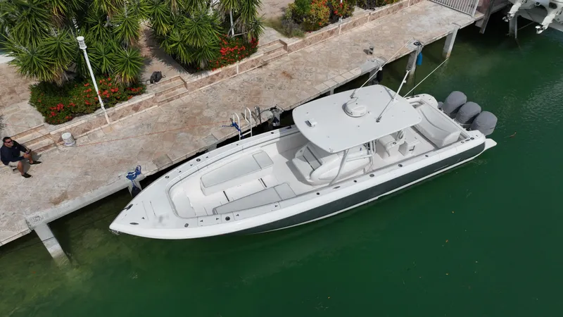  Yacht Photos Pics 2015 Intrepid 400 Center Console boat docked in a marina.