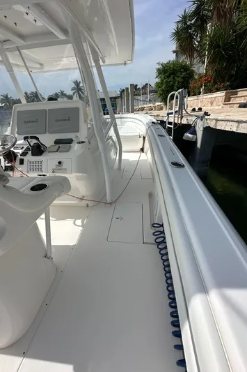  Yacht Photos Pics 2015 Intrepid 400 Center Console boat with sleek white deck and modern controls.