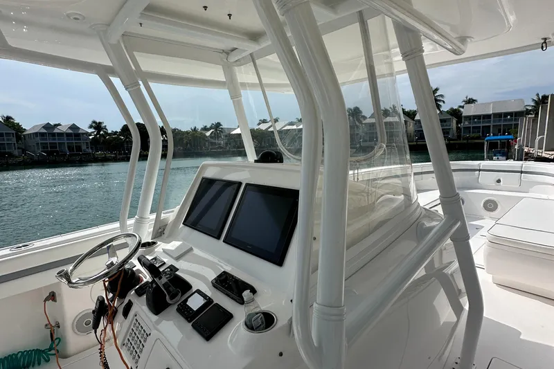  Yacht Photos Pics 2015 Intrepid 400 Center Console boat interior with dual screens and steering wheel.