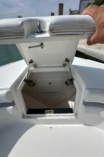  Yacht Photos Pics 2015 Intrepid 400 Center Console boat storage compartment open on deck.