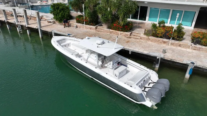 Yacht Photos Pics 2015 Intrepid 400 Center Console boat docked by waterfront property.