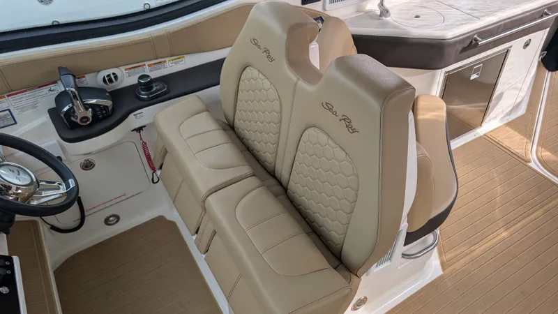  Yacht Photos Pics Interior of 2024 Sea Ray Sundancer 320 Coupe with beige seats.