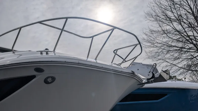  Yacht Photos Pics 2024 Sea Ray Sundancer 320 Coupe under cloudy sky.