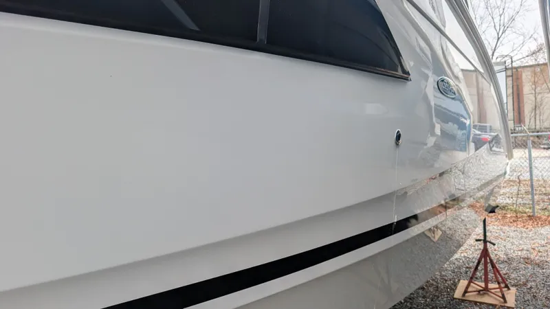  Yacht Photos Pics 2024 Sea Ray Sundancer 320 Coupe side view outdoors.