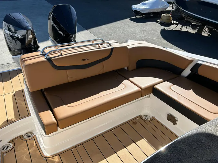  Yacht Photos Pics 2023 Chaparral 300 OSX boat with tan seating and dual Mercury engines.
