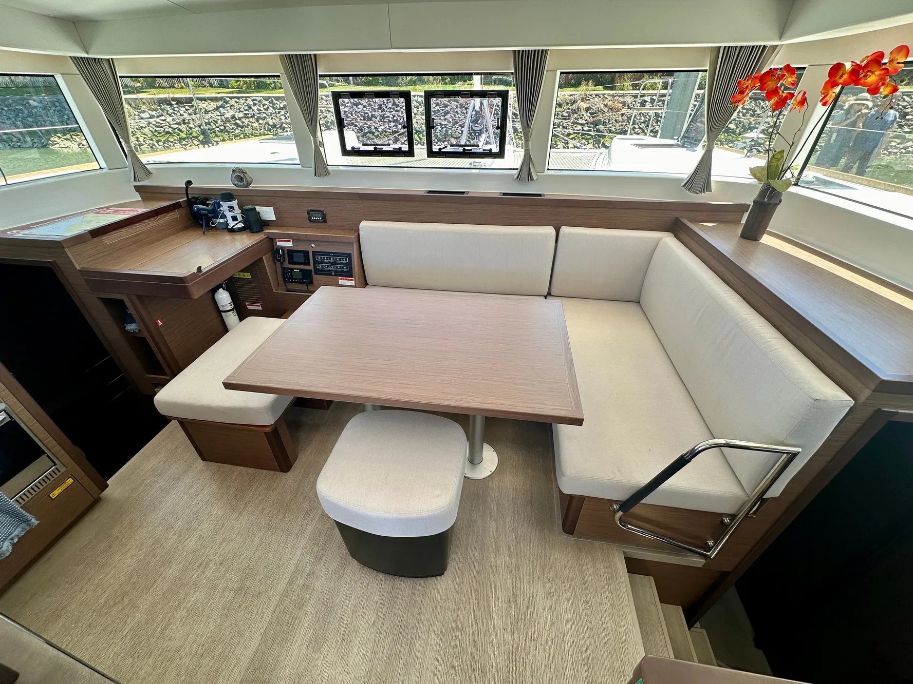 Interior of 2020 Lagoon 40 yacht with modern seating and dining area.