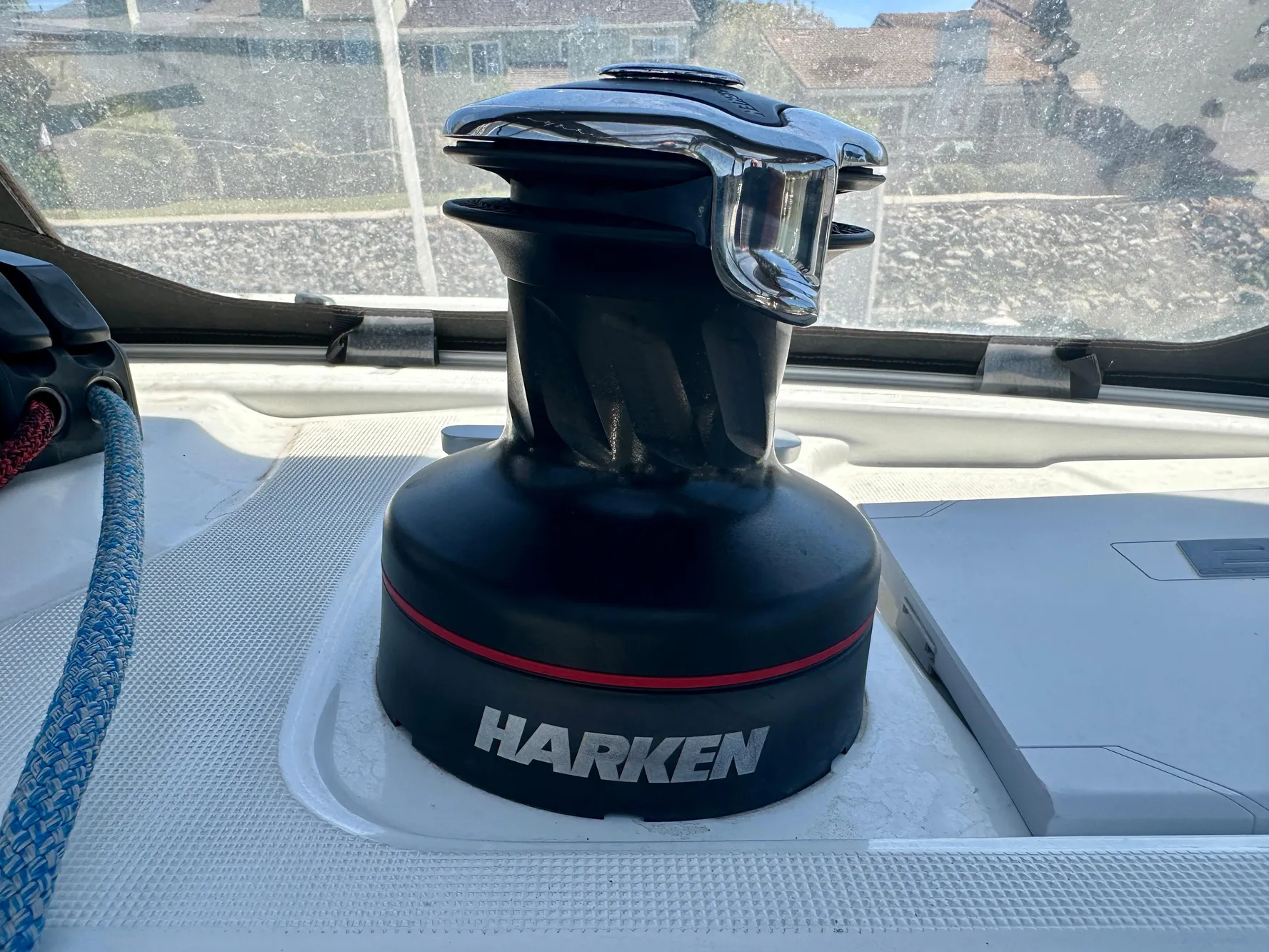 Harken winch on 2020 Lagoon 40 catamaran deck, with blue rope nearby.