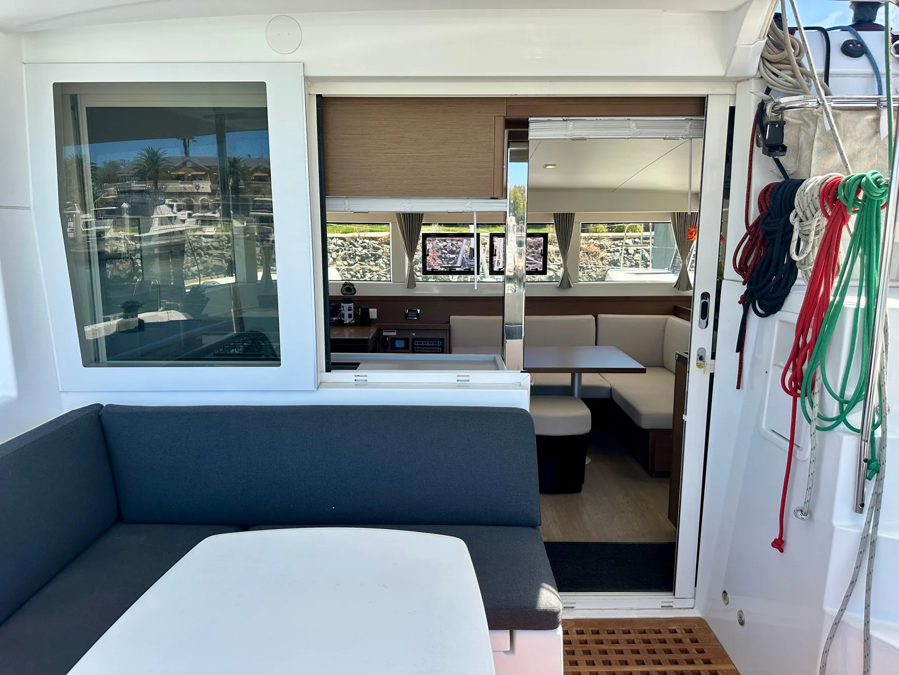 Interior view of 2020 Lagoon 40 catamaran with seating and nautical ropes.