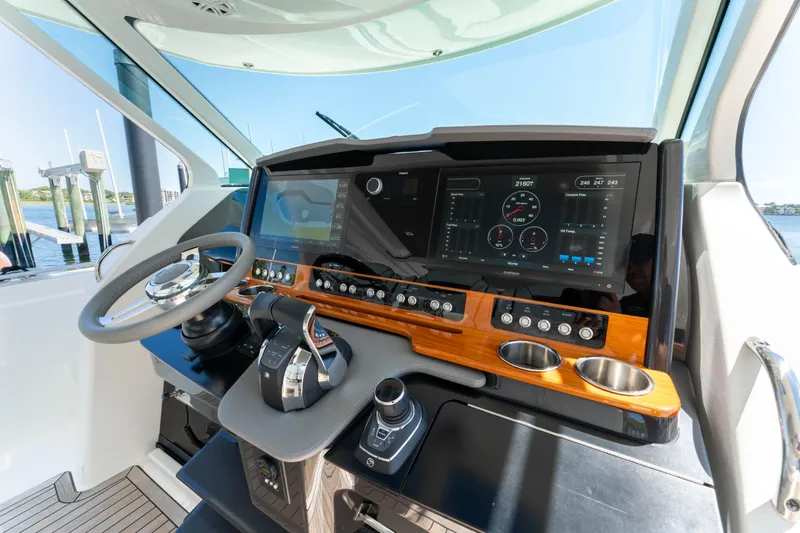 La Dolce Vita Yacht Photos Pics 2020 Tiara Yachts 38 LS helm with advanced navigation controls and sleek design.