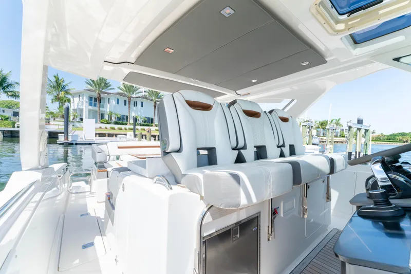 La Dolce Vita Yacht Photos Pics Luxurious 2020 Tiara Yachts 38 LS interior with plush seating and modern design.
