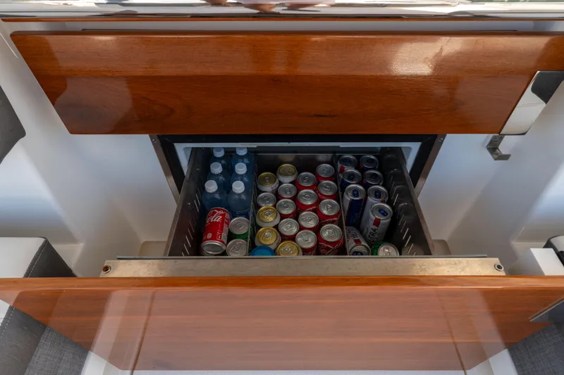 La Dolce Vita Yacht Photos Pics Built-in cooler with assorted drinks on 2020 Tiara Yachts 38 LS.