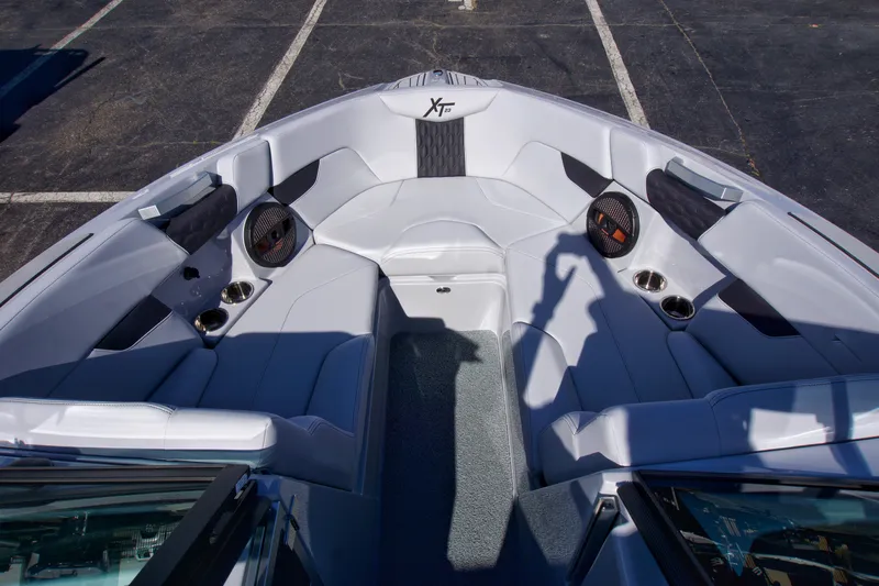  Yacht Photos Pics 2025 MasterCraft XT23 boat interior with sleek seating and modern design.