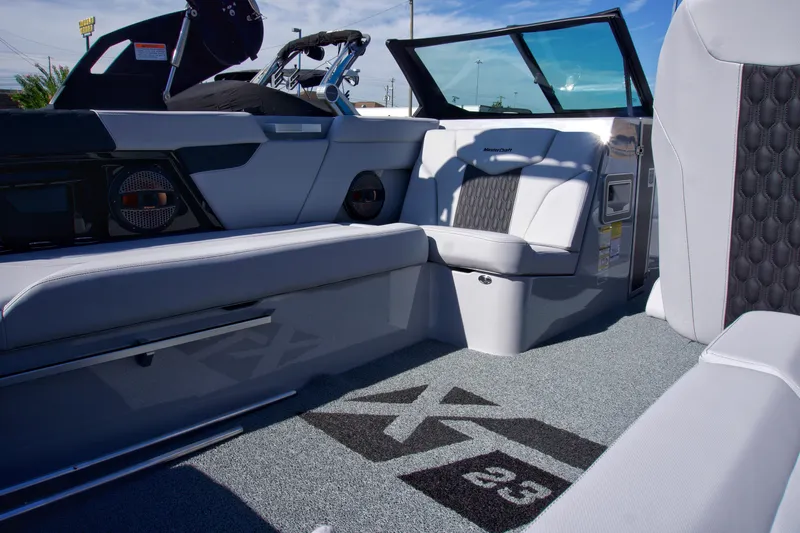  Yacht Photos Pics 2025 MasterCraft XT23 boat interior with sleek seating and modern design.