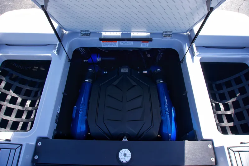  Yacht Photos Pics 2025 MasterCraft XT23 engine compartment with blue accents.