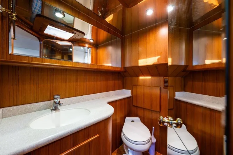  Yacht Photos Pics Luxurious wooden bathroom interior on 2000 Symbol 42 Classic Trawler yacht.