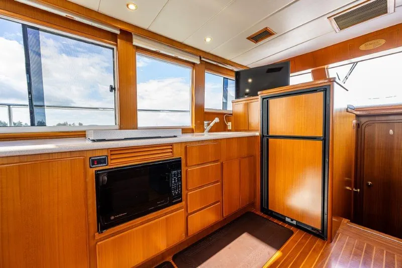  Yacht Photos Pics Interior of 2000 Symbol 42 Classic Trawler with wood cabinetry and modern appliances.