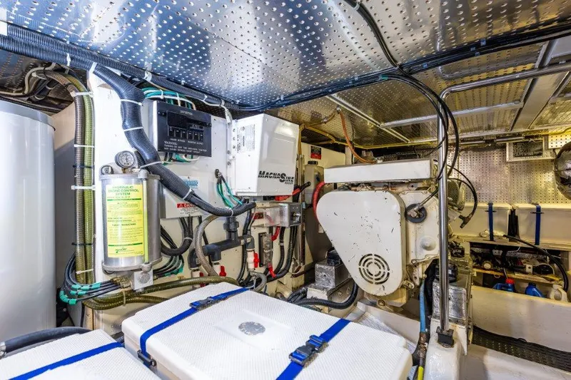  Yacht Photos Pics Engine room of 2000 Symbol 42 Classic Trawler with mechanical equipment and wiring.