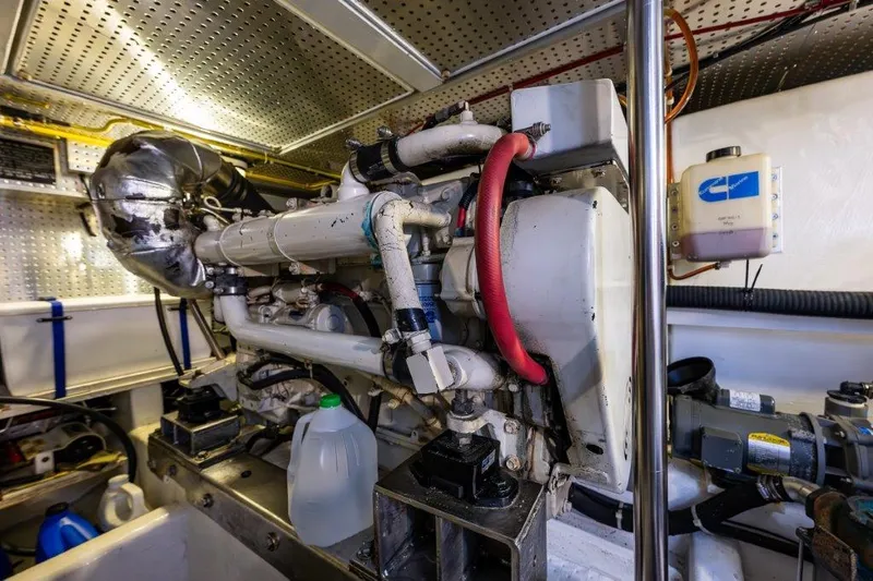  Yacht Photos Pics Engine room of 2000 Symbol 42 Classic Trawler with visible machinery and components.