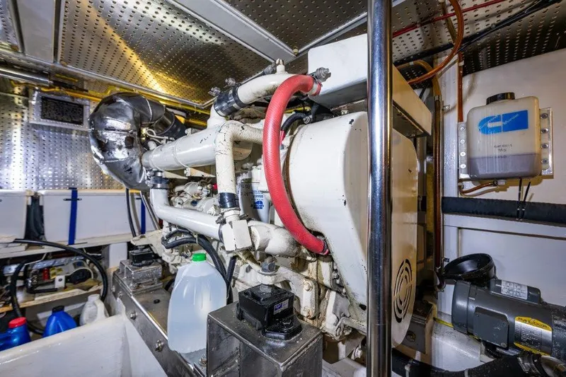  Yacht Photos Pics Engine room of 2000 Symbol 42 Classic Trawler with visible machinery and equipment.