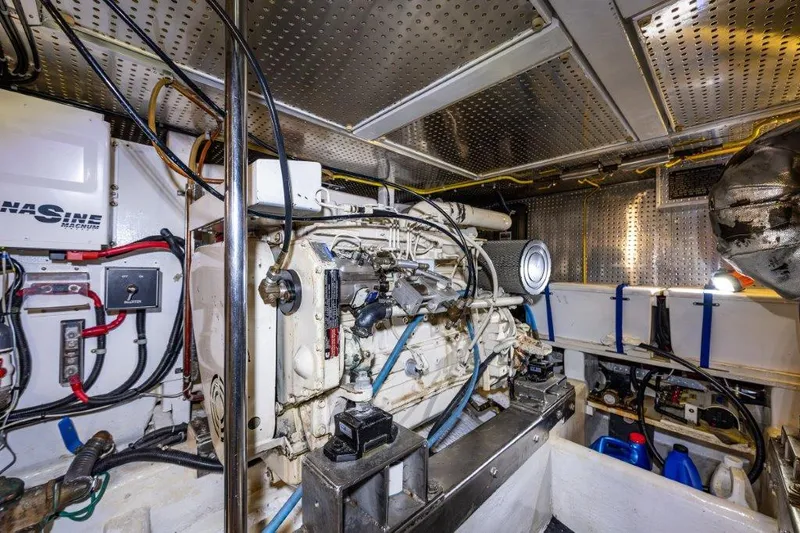  Yacht Photos Pics Engine room of 2000 Symbol 42 Classic Trawler with visible machinery and wiring.